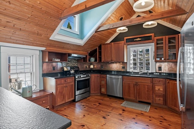 kitchen with wood ceiling, a sink, open shelves, vaulted ceiling with beams, and appliances with stainless steel finishes