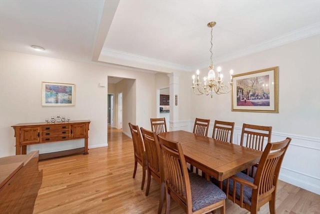 40 Canoe Lndg, Plymouth, MA 02360 - dining space featuring a chandelier, light wood-style floors, and crown molding