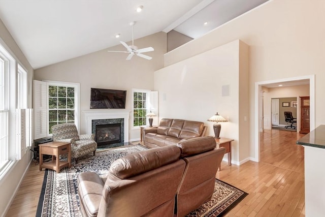 40 Canoe Lndg, Plymouth, MA 02360 - living room with high vaulted ceiling, ceiling fan, light wood-style floors, a premium fireplace, and recessed lighting