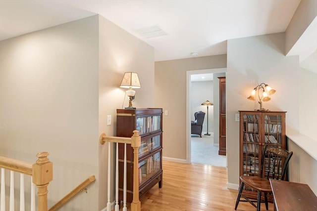 40 Canoe Lndg, Plymouth, MA 02360 - corridor with an upstairs landing, light wood-type flooring, and baseboards