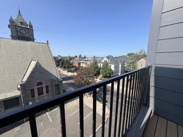 balcony featuring a residential view