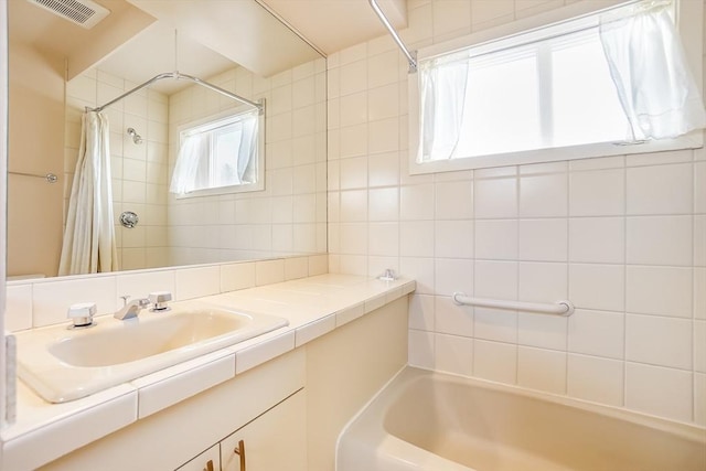 25 Hopewell Farm Rd Unit 25, Natick, MA 01760 - full bath featuring healthy amount of natural light, vanity, a bath, and a shower with shower curtain