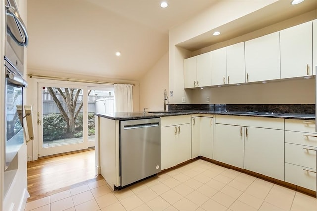 25 Hopewell Farm Rd Unit 25, Natick, MA 01760 - kitchen featuring dishwasher, a sink, recessed lighting, vaulted ceiling, and a peninsula