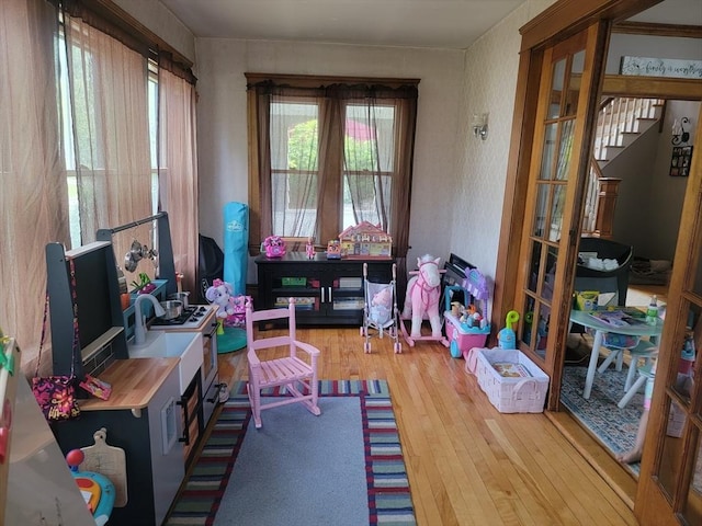 playroom featuring hardwood / wood-style flooring