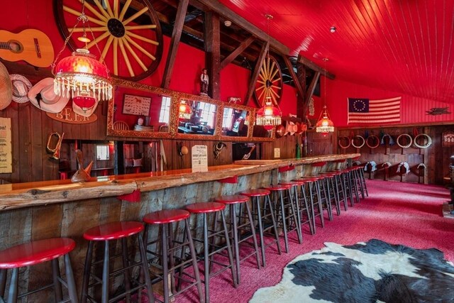 192 W Main St, Westborough, MA 01581 - bar featuring a community bar, wooden walls, carpet flooring, and wooden ceiling