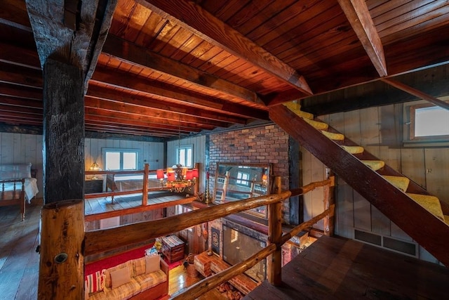 192 W Main St, Westborough, MA 01581 - staircase with hardwood / wood-style floors, wooden ceiling, beamed ceiling, and wood walls