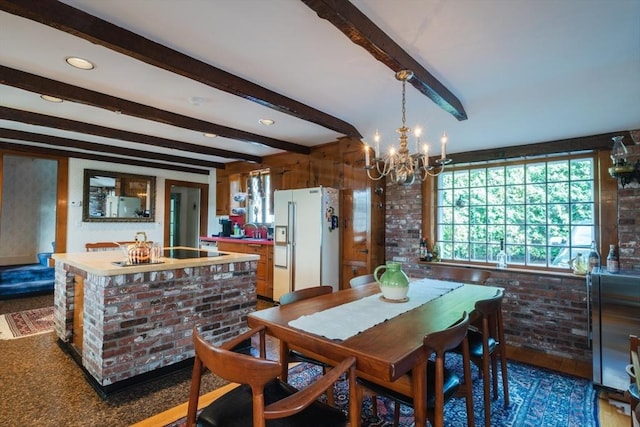 192 W Main St, Westborough, MA 01581 - dining space featuring a chandelier, beamed ceiling, and brick wall