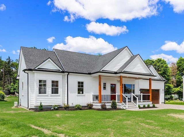28 Marlboro Rd, Woburn, MA 01801 - modern farmhouse featuring covered porch, a garage, driveway, roof with shingles, and a front yard
