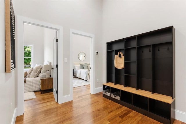 28 Marlboro Rd, Woburn, MA 01801 - mudroom with light wood finished floors and baseboards