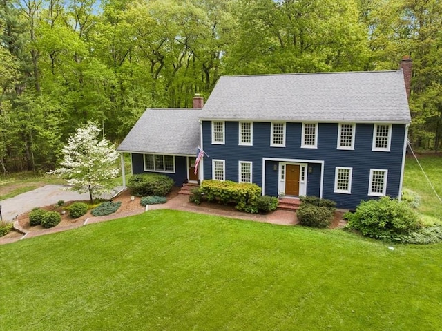 94 Middleton Rd, Boxford, MA 01921 - colonial-style house featuring a chimney and a front yard