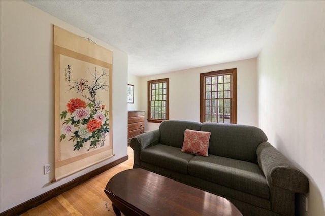 94 Middleton Rd, Boxford, MA 01921 - living area with light wood-type flooring and baseboards