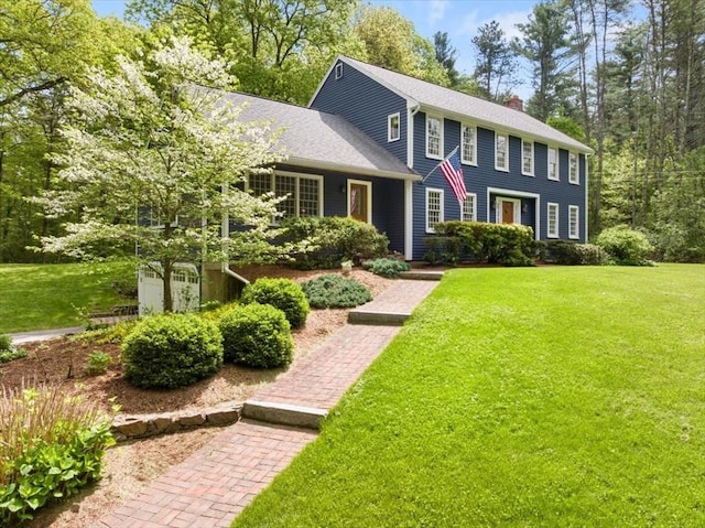 94 Middleton Rd, Boxford, MA 01921 - colonial-style house featuring a chimney, a front lawn, and a shingled roof