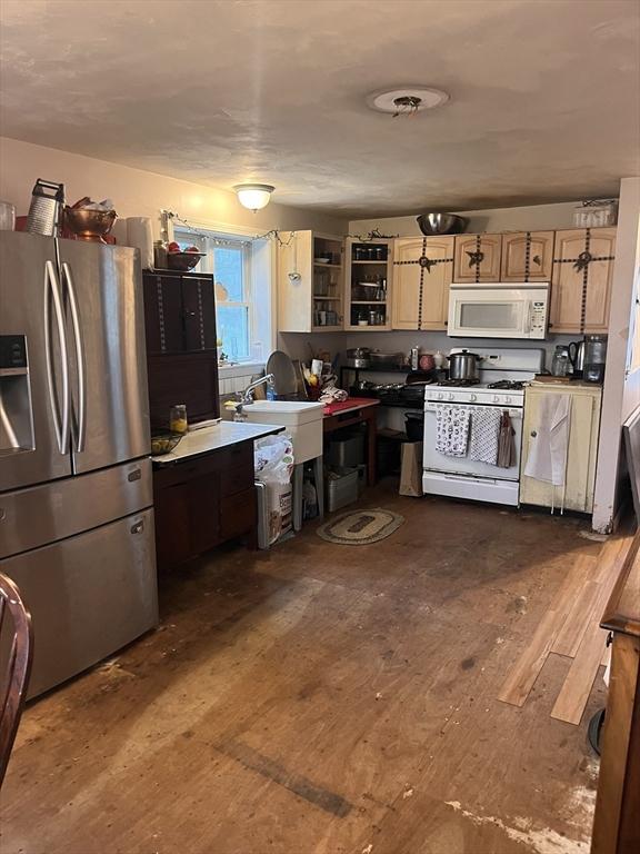 21 Shannon Way, Barnstable, MA 02632 - kitchen featuring a sink, glass insert cabinets, dark wood-type flooring, light brown cabinetry, and white appliances