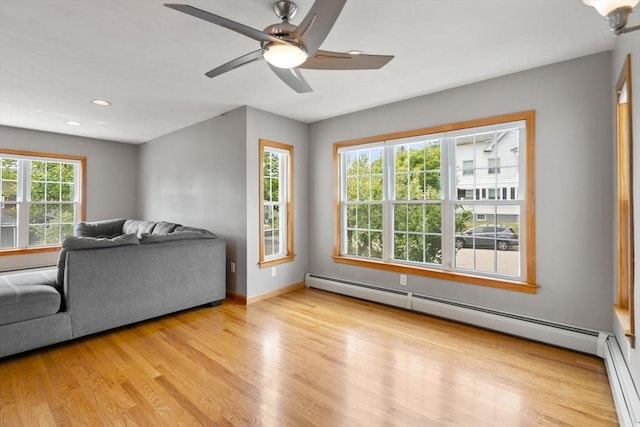 4 Hadwen Rd, Worcester, MA 01602 - living area with a baseboard radiator, wood finished floors, recessed lighting, baseboards, and a ceiling fan