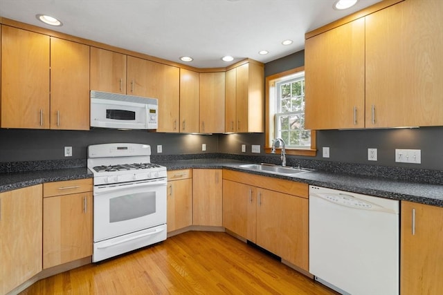 4 Hadwen Rd, Worcester, MA 01602 - kitchen featuring white appliances, a sink, light wood-style flooring, recessed lighting, and dark countertops