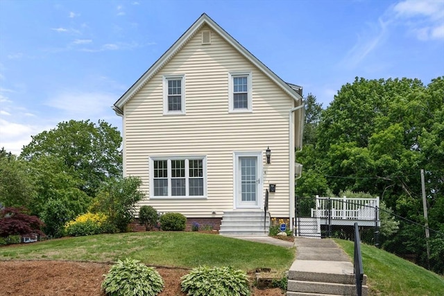 4 Hadwen Rd, Worcester, MA 01602 - rear view of house featuring a lawn, a deck, and entry steps