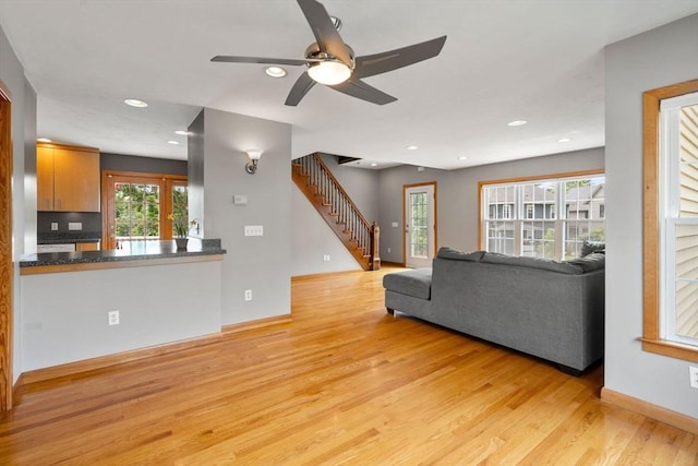 4 Hadwen Rd, Worcester, MA 01602 - living area featuring light wood-style floors, stairway, recessed lighting, a ceiling fan, and baseboards