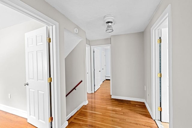 32 Gannett Pasture Ln, Scituate, MA 02066 - hallway with light wood-type flooring and baseboard heating