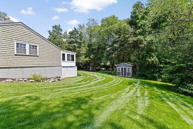 32 Gannett Pasture Ln, Scituate, MA 02066 - view of green lawn featuring a shed