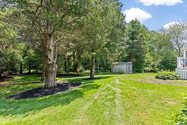 32 Gannett Pasture Ln, Scituate, MA 02066 - view of green lawn featuring a storage unit