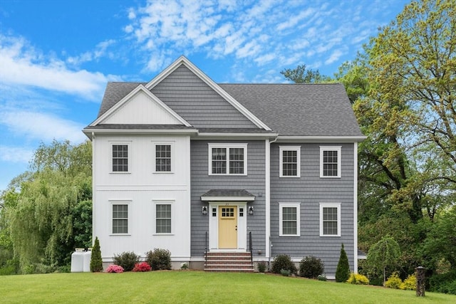 35 Lucaya Cir, Wilmington, MA 01887 - view of front facade featuring a front lawn and roof with shingles