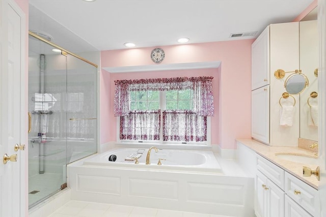 bathroom featuring a shower stall, a bath, vanity, and recessed lighting