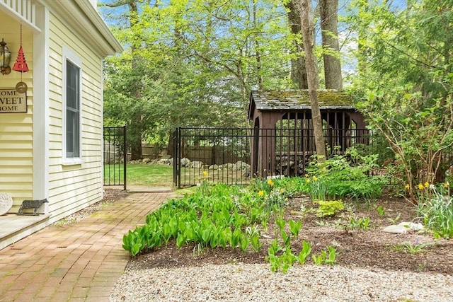 view of yard with fence and a gate