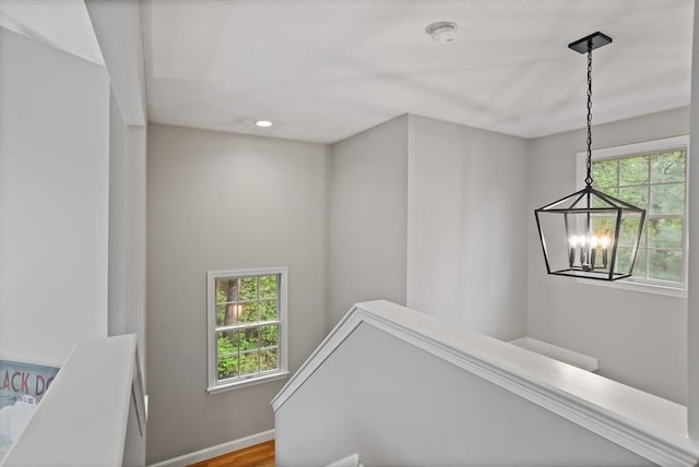 21 Mcdonough Dr, Marlborough, MA 01752 - stairway with a chandelier, recessed lighting, wood finished floors, and baseboards