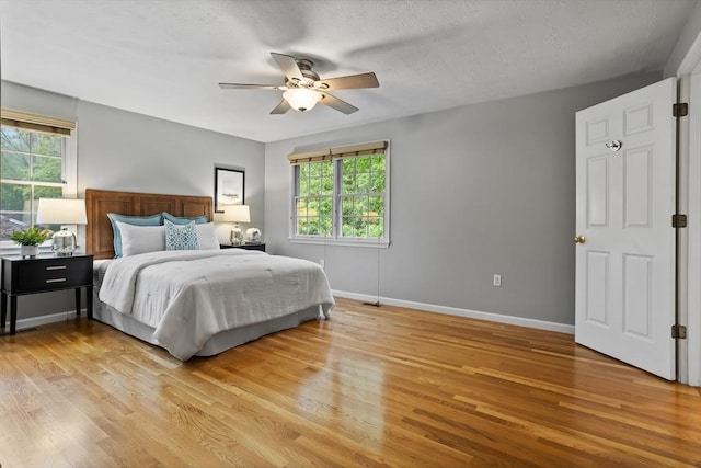 21 Mcdonough Dr, Marlborough, MA 01752 - bedroom with multiple windows and light wood-type flooring