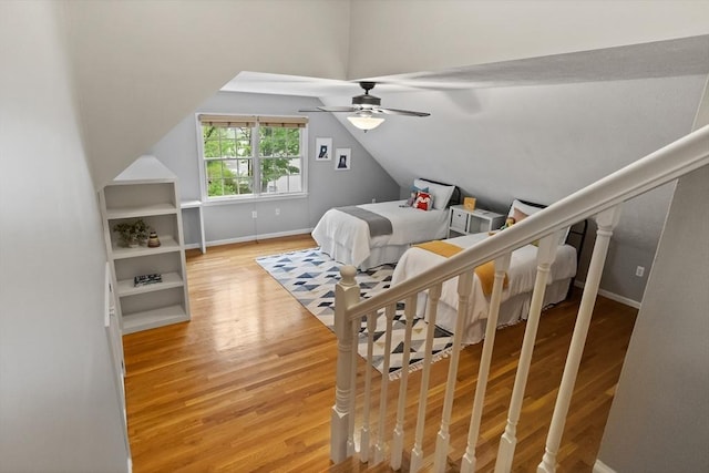 21 Mcdonough Dr, Marlborough, MA 01752 - bedroom with wood finished floors, baseboards, vaulted ceiling, and ceiling fan