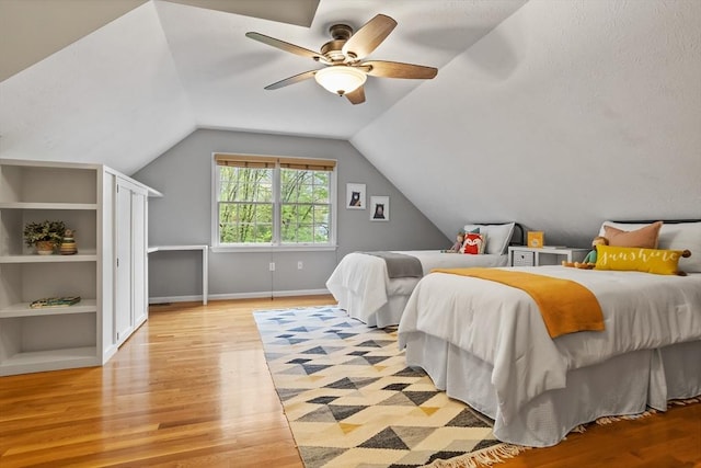 21 Mcdonough Dr, Marlborough, MA 01752 - bedroom featuring light wood finished floors, vaulted ceiling, ceiling fan, and baseboards