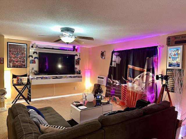 living room featuring carpet flooring, a ceiling fan, a textured ceiling, and a wall mounted air conditioner