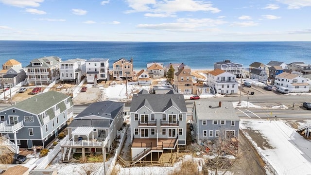 aerial view featuring a residential view and a water view