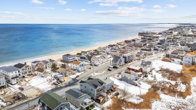 bird's eye view with a residential view and a water view