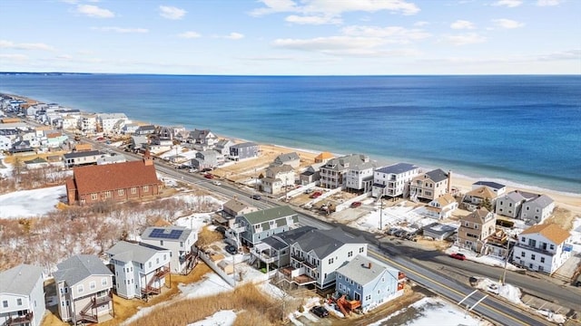 bird's eye view featuring a water view and a residential view