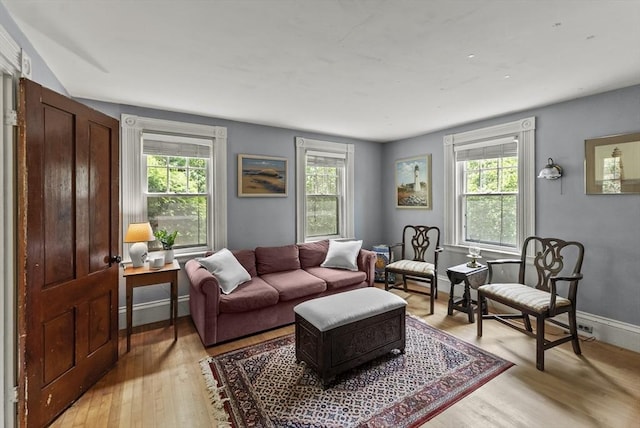 38 Booth Hill Rd, Scituate, MA 02066 - living area with healthy amount of natural light and light wood-type flooring