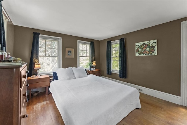 38 Booth Hill Rd, Scituate, MA 02066 - bedroom with dark wood-type flooring and baseboards