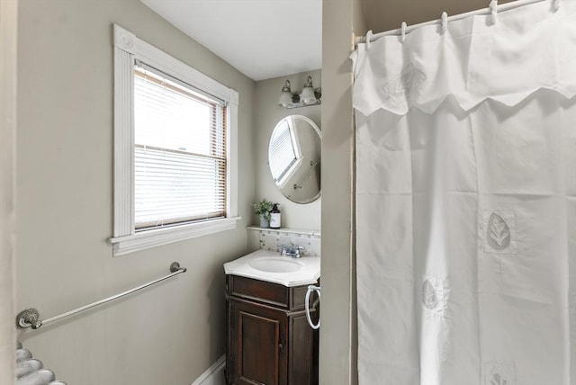 38 Booth Hill Rd, Scituate, MA 02066 - bathroom featuring vanity, curtained shower, and decorative backsplash