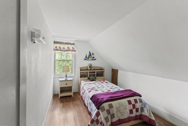 38 Booth Hill Rd, Scituate, MA 02066 - bedroom featuring wood finished floors and lofted ceiling