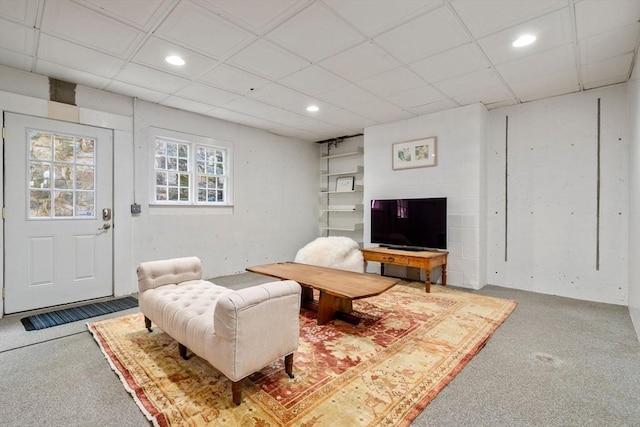 living room with recessed lighting and carpet floors