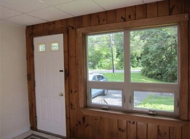 83 Brigham St, Hudson, MA 01749 - doorway with baseboards and wood walls