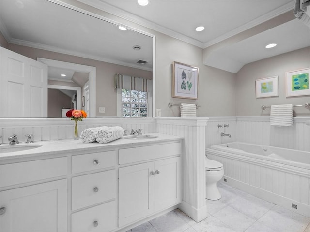 bathroom with crown molding, a wainscoted wall, a garden tub, double vanity, and recessed lighting