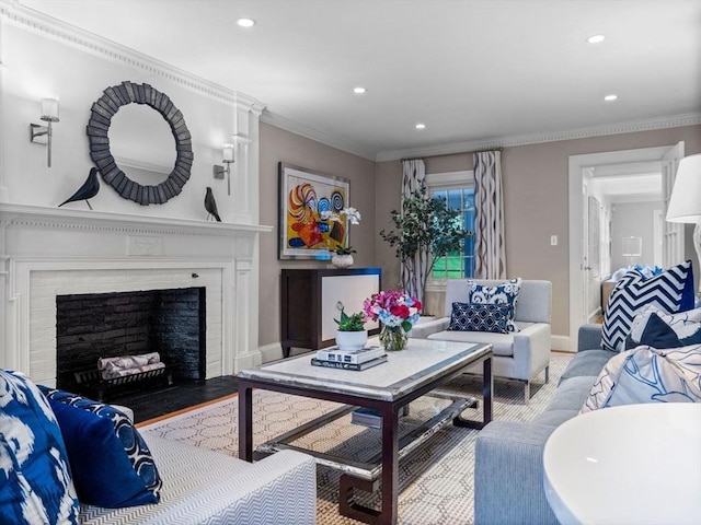 living area with recessed lighting, a brick fireplace, ornamental molding, and baseboards
