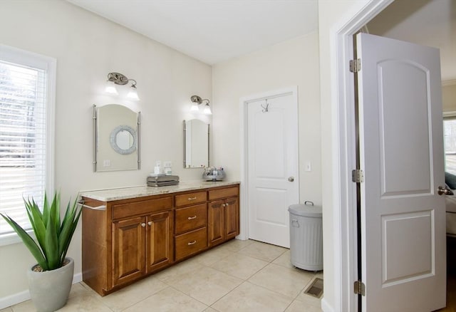 bathroom featuring tile patterned floors and vanity