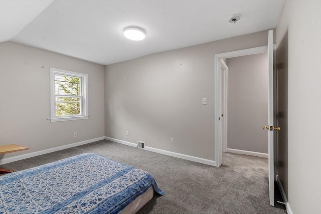 12 Allen Ct Unit 12, Northborough, MA 01532 - carpeted bedroom featuring baseboards and vaulted ceiling