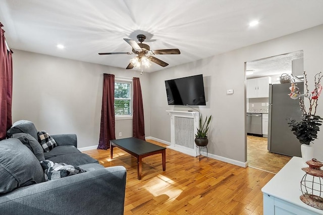 12 Allen Ct Unit 12, Northborough, MA 01532 - living area featuring light wood-style floors, ceiling fan, recessed lighting, and baseboards
