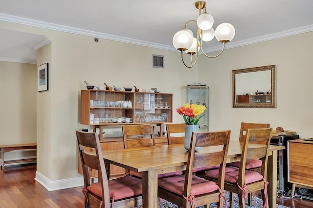 75-83 Cambridge Pkwy Unit W403, Cambridge, MA 02142 - dining room with ornamental molding, wood finished floors, baseboards, and a chandelier