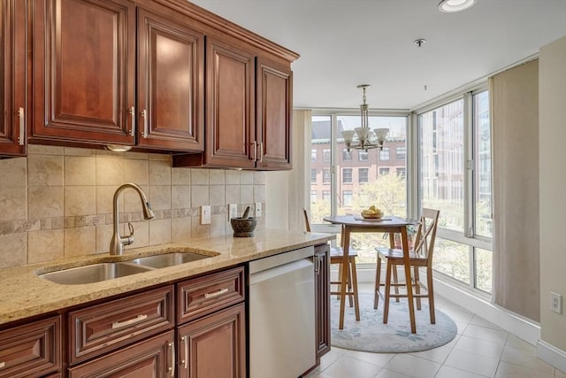 75-83 Cambridge Pkwy Unit W403, Cambridge, MA 02142 - kitchen with stainless steel dishwasher, a sink, healthy amount of natural light, and a chandelier