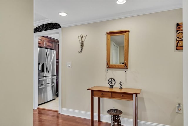 75-83 Cambridge Pkwy Unit W403, Cambridge, MA 02142 - corridor featuring crown molding, baseboards, light wood finished floors, and recessed lighting
