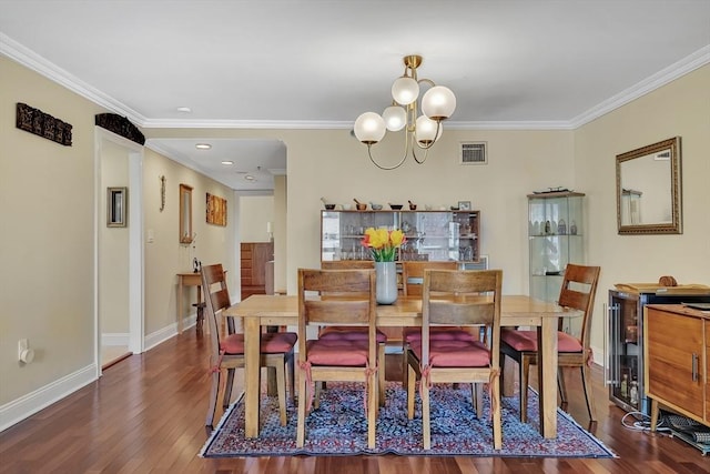 75-83 Cambridge Pkwy Unit W403, Cambridge, MA 02142 - dining area with wood finished floors, a chandelier, crown molding, baseboards, and recessed lighting